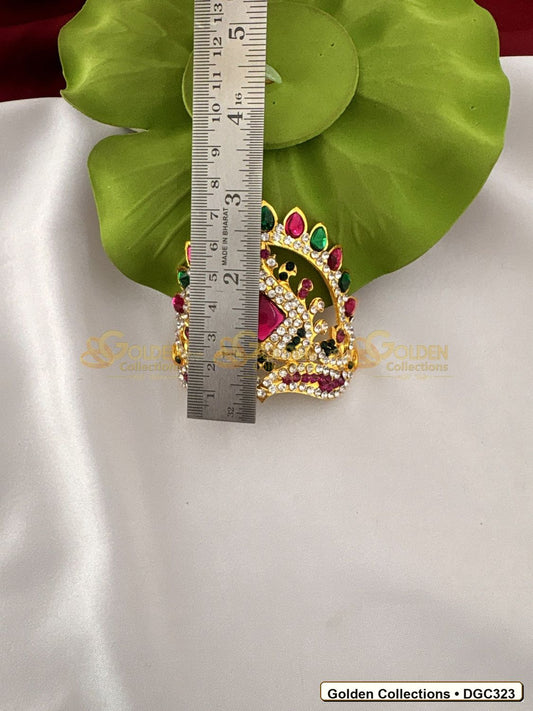 Angled view of Small Arch Deity Crown Mukut with Pink Center Stone 2.5 x 3.5 x 2.75 inches DGC323 from Golden Collections