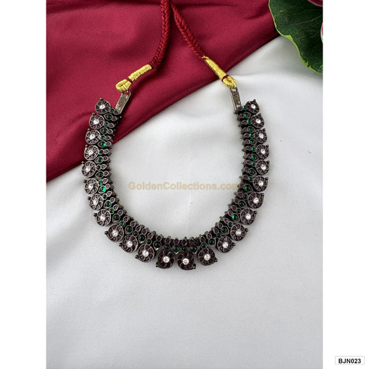 Black kemp green purple short necklace with red tie cord angled view BJN023