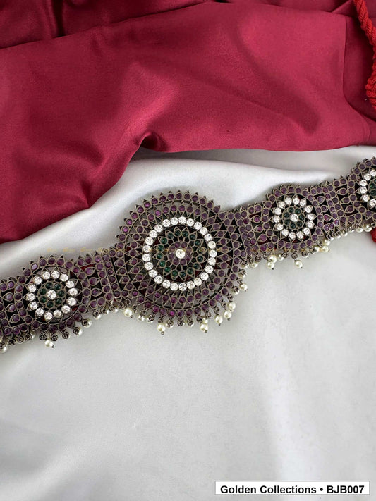angled product view of Black kemp round medallion vaddanam oddiyanam from Golden Collections