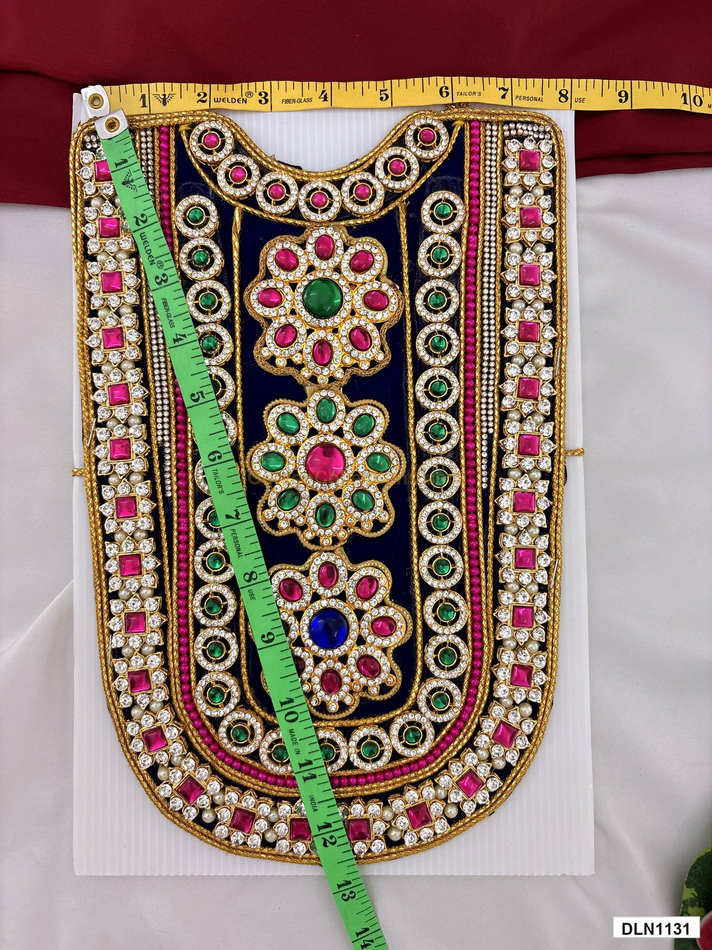 Measurement photo showing 12 x 8 Inches deity chest long haram with measuring tape for idol alankaram
