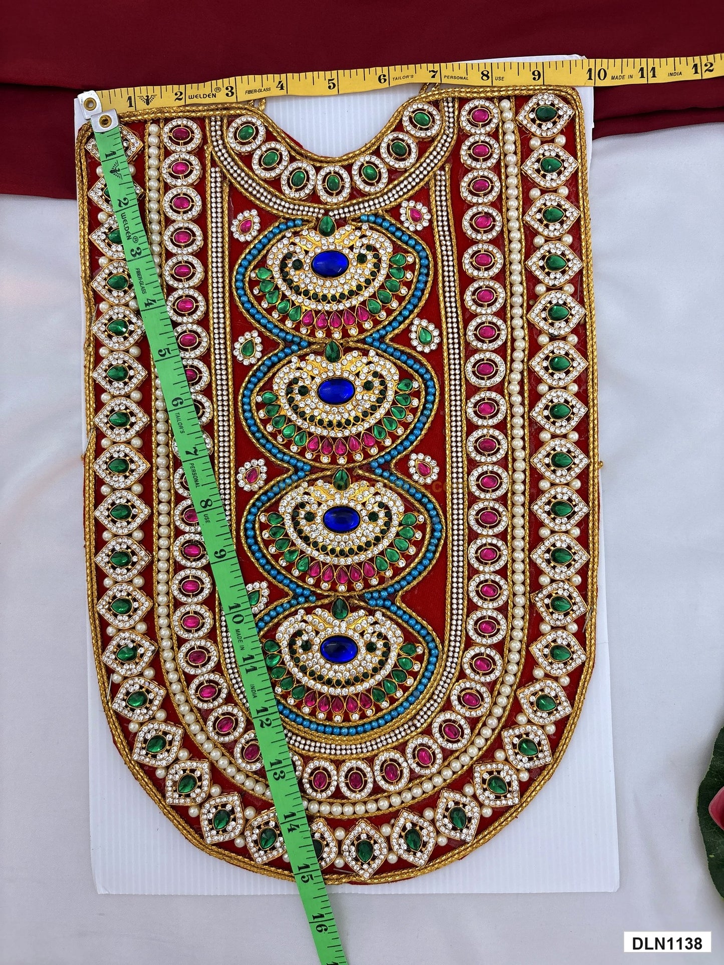 Measurement photo showing 15 x 10 Inches deity chest long haram with measuring tape for idol alankaram