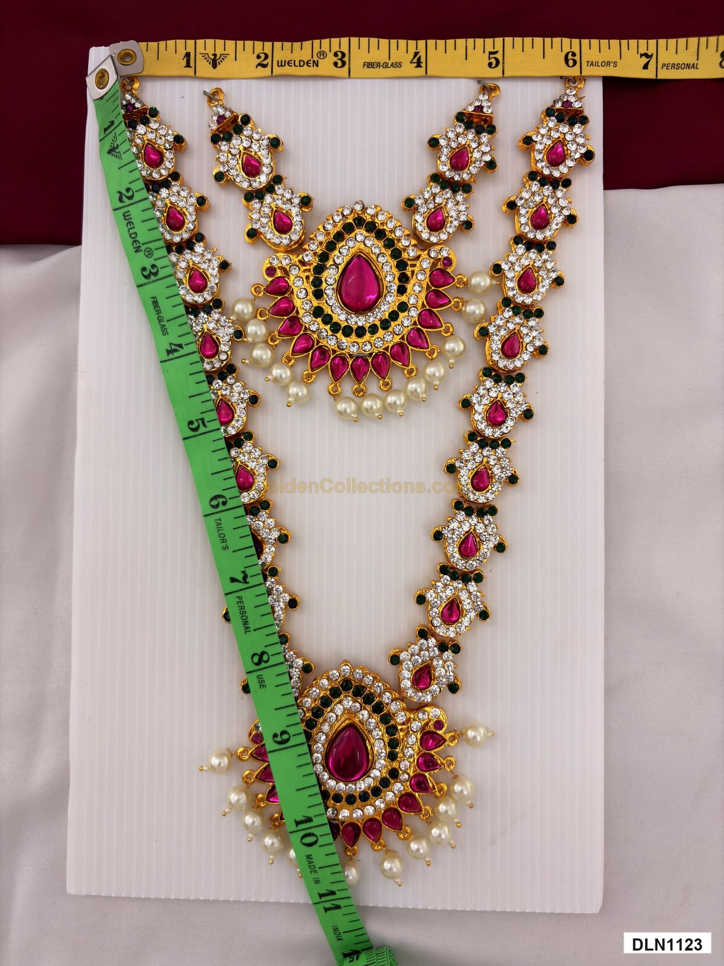 Measurement photo showing 10 x 6 Inches deity chest long haram with measuring tape for idol alankaram