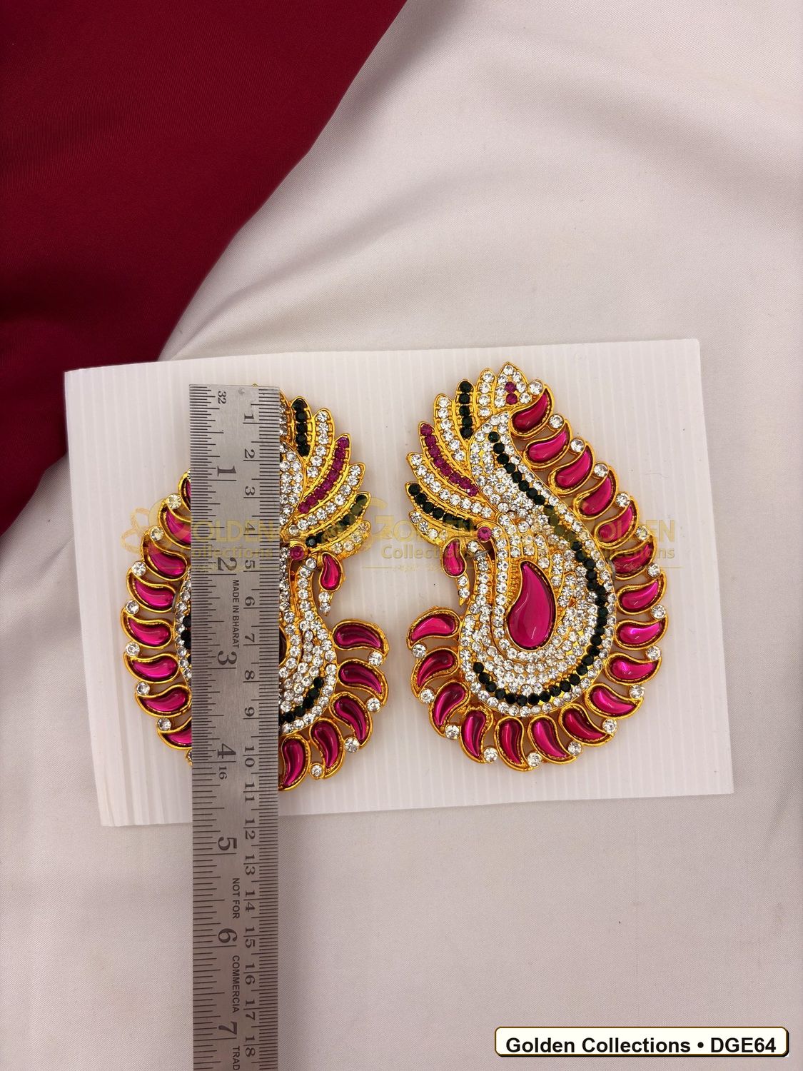 Close-up detail of Karna Pathakam Deity Earrings with Pink Green Stones 4.5 x 3 inches DGE64 from Golden Collections