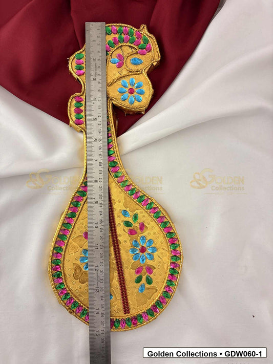 Measurement photo showing 15 x 6 Inches gold-plated saraswati veena for idol alankaram for deity idol alankaram