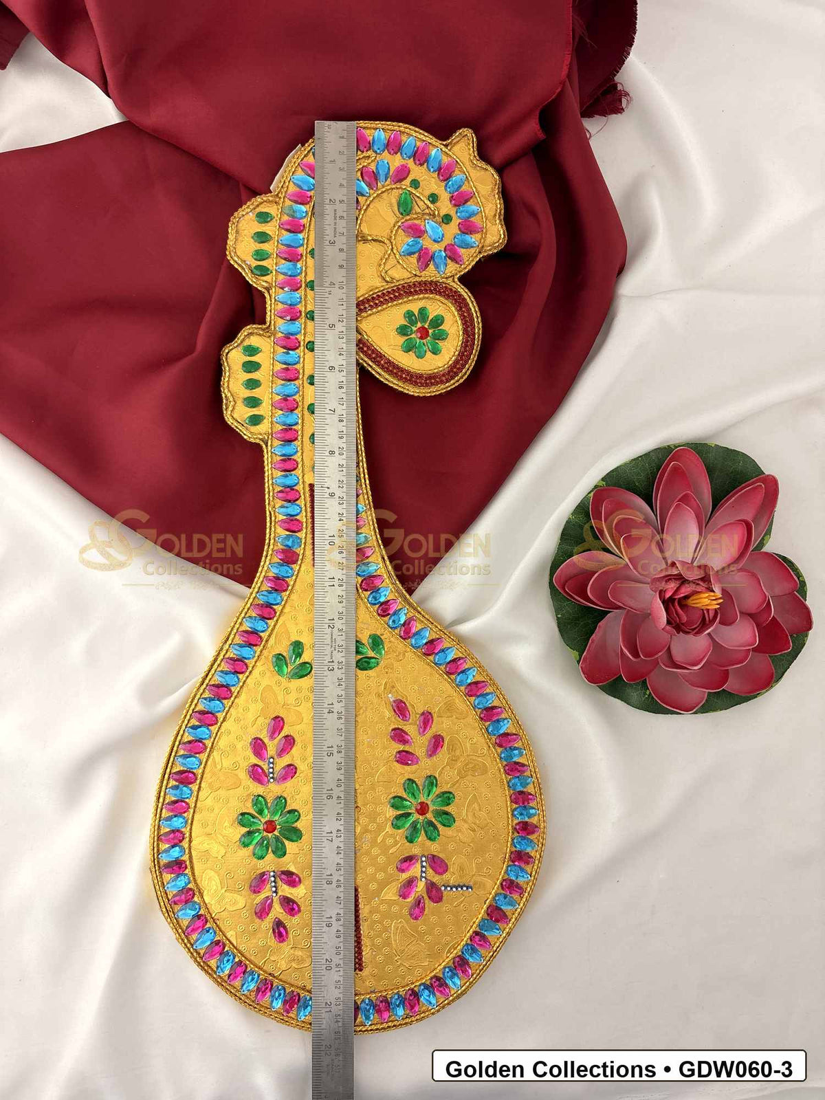 Measurement photo showing 21 x 9 Inches gold-plated saraswati veena for idol alankaram for deity idol alankaram