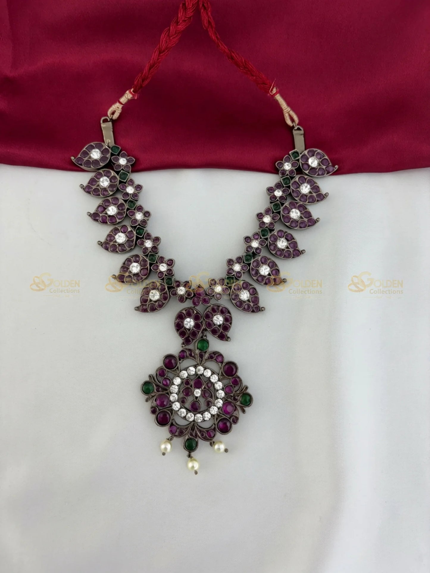 Golden Collections Kemp Petal 'V' Design Short Necklace - Angled view highlighting the dangling faux pearls and detailed antique finish.