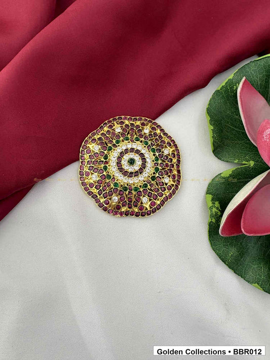 Angled product view of Large Round Real Kemp Rakodi with Red Green Stones from Golden Collections
