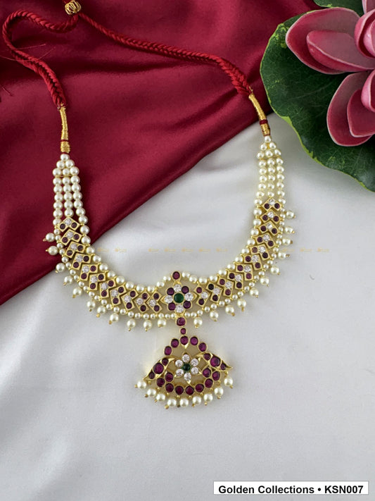 Angled product view of Pearl Border Real Kemp Short Necklace with Red Stones from Golden Collections