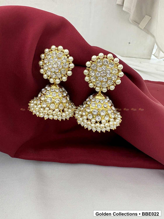 Angled product view of Pearl Cluster Real Kemp Dome Jhumki Earrings from Golden Collections
