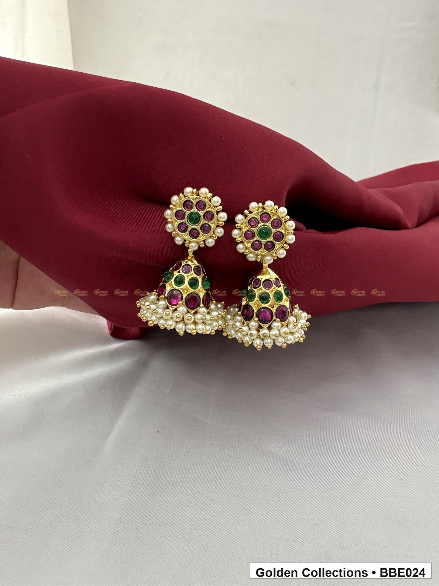 Angled product view of Pearl Drop Real Kemp Jhumki Earrings from Golden Collections