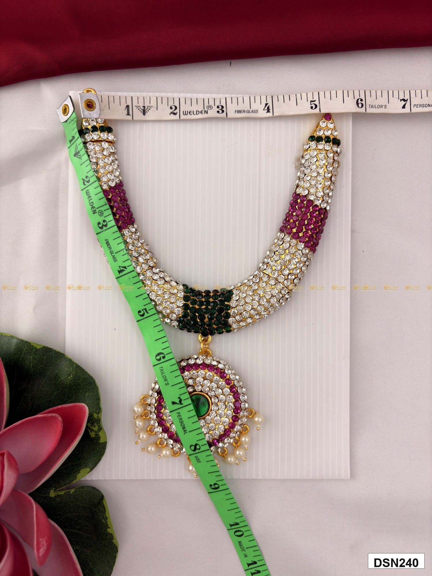 Measurement photo of deity short haram with measuring tape for idol alankaram size reference