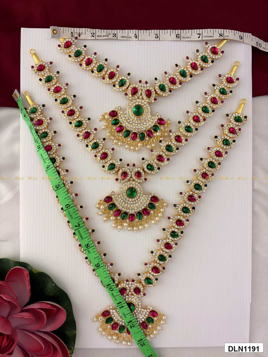Measurement photo of deity long haram set with measuring tape for idol alankaram size reference