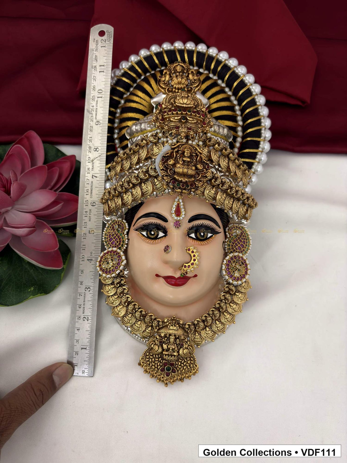 Measurement view of Varalakshmi Tanjore Face with Layered Deity Crown and Long Sculpted Pendant with ruler beside the product