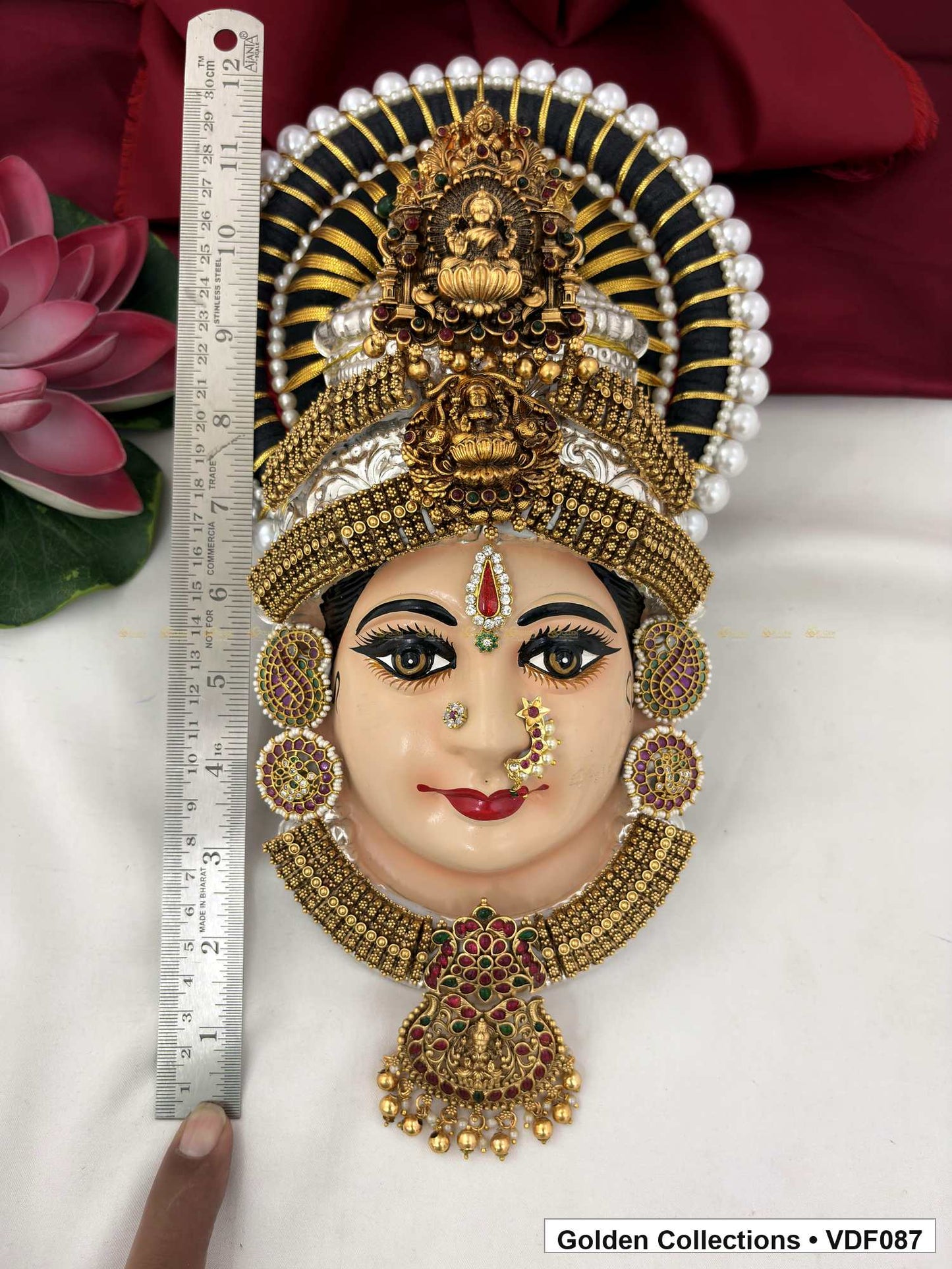 Varalakshmi Tanjore Face with Pearl-Halo Crown and Teardrop Pendant close-up detail view