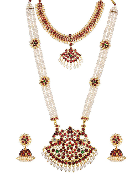 Bharatanatyam long haram with red, green and clear stones, shown with short necklace and matching earrings