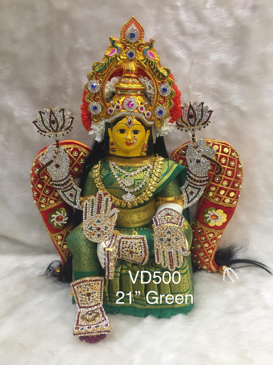 Beautiful Varalakshmi Vratham pooja doll adorned with flowers, symbolizing abundance and blessings.