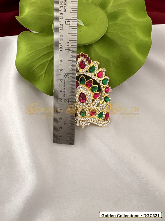 Angled view of Small Layered Arch Deity Crown Mukut Pink Green Stones 3 x 3 x 2.5 inches DGC321 from Golden Collections