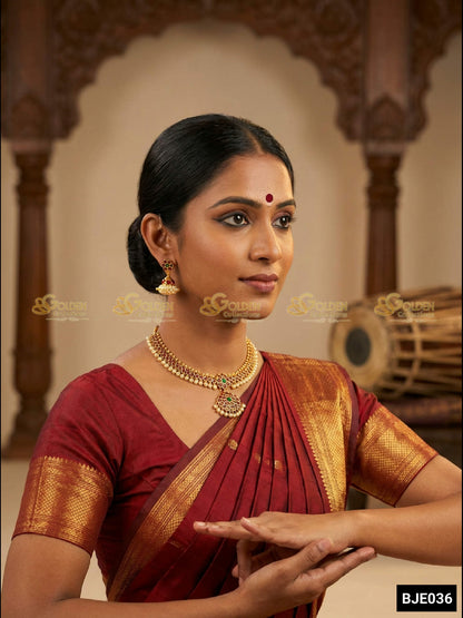GoldenCollections Bharatanatyam Earrings - Model wearing earrings with traditional saree in a culturally rich indoor setting.