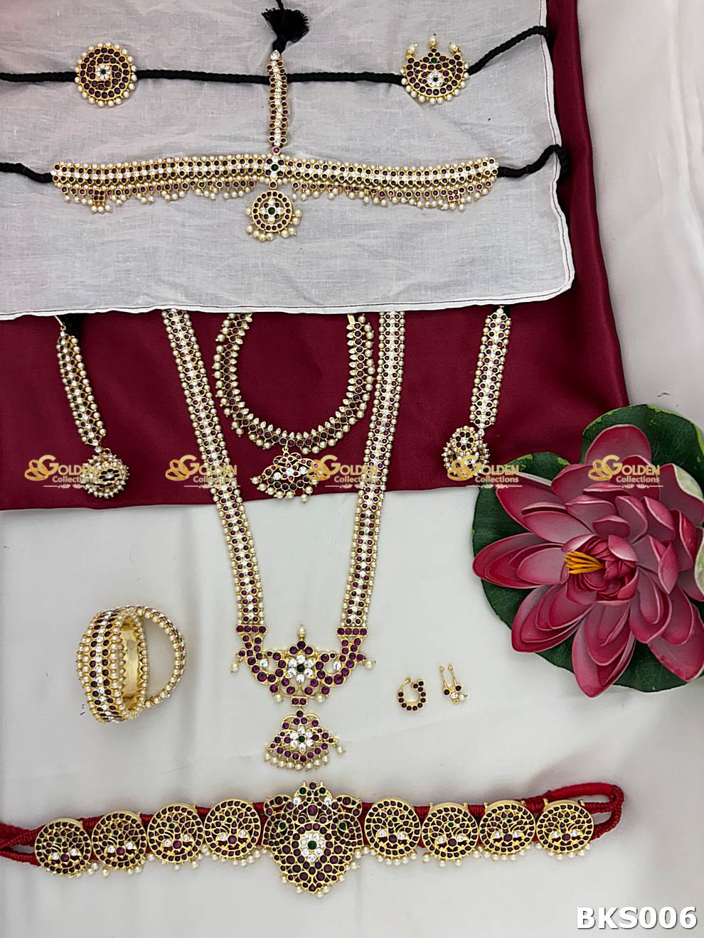 Kemp stone long haram from Bharatanatyam temple jewellery set with pearls and antique gold finish