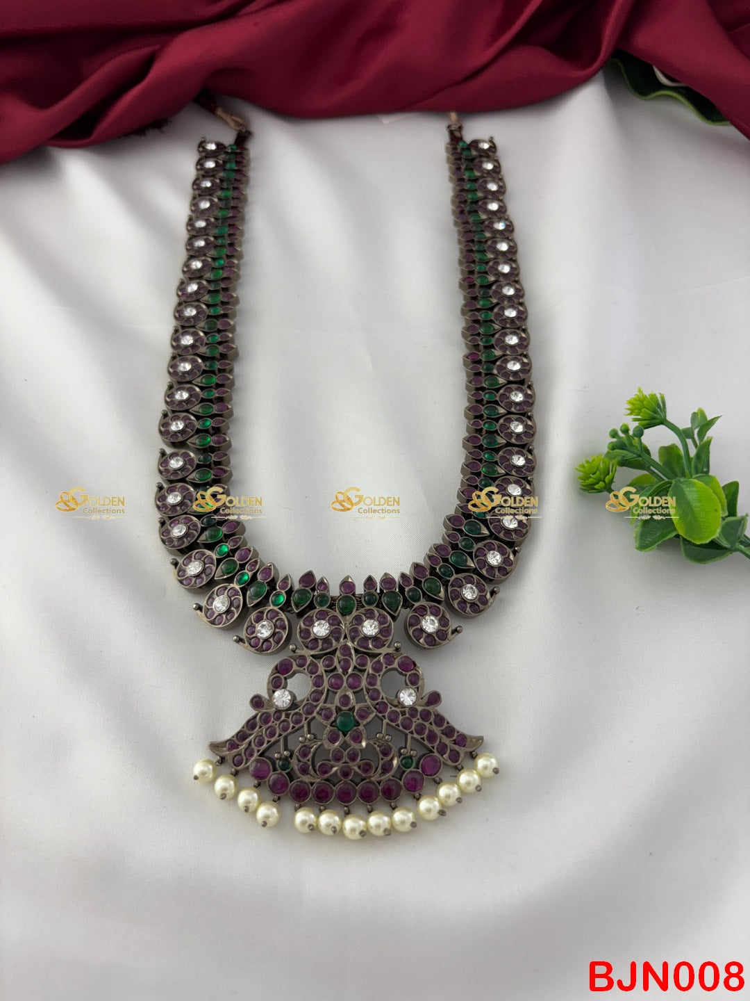 traditional South Indian temple jewellery piece featuring mango motifs, Kemp stones