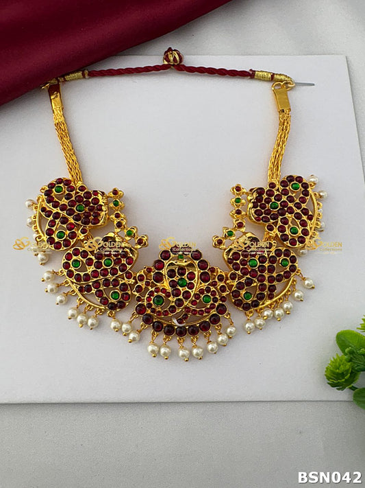 Bharatanatyam short necklace with ruby green kemp stones and pearl drops temple jewellery
