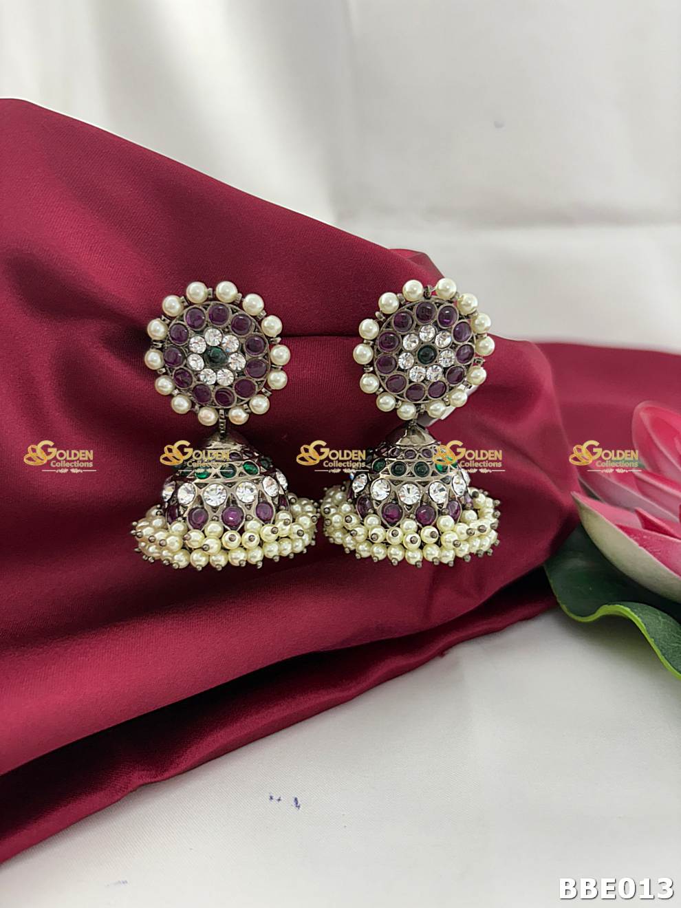 Shop Black Kemp Jhumki Earrings for Bharatanatyam & Kuchipudi. Authentic temple jewellery with pearls & stones. Perfect for Arangetram & weddings.
