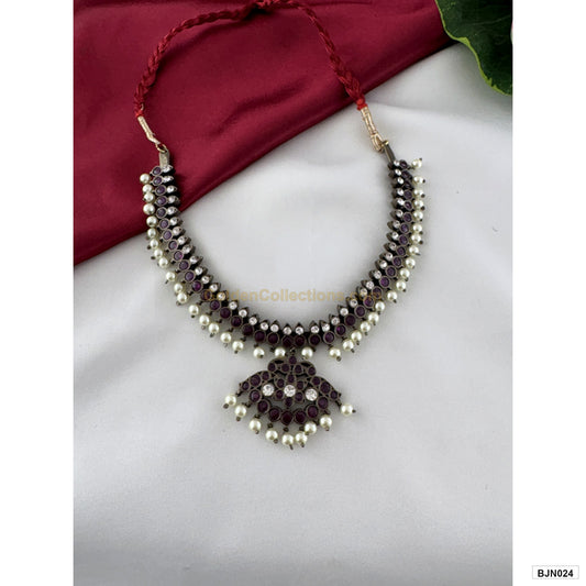 Black kemp pearl short necklace with purple stones angled view BJN024