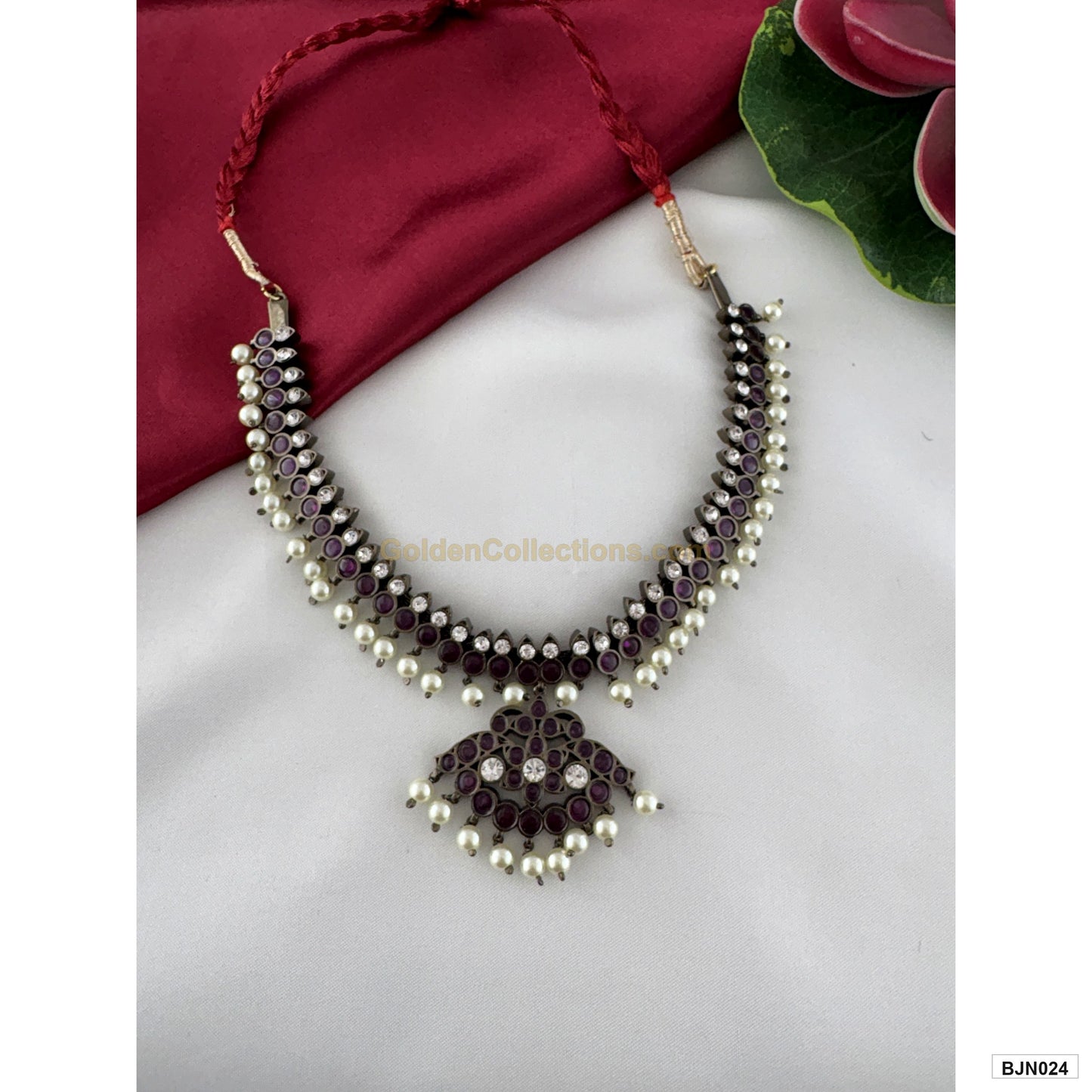 Black kemp pearl drops and purple stone pendant close-up BJN024