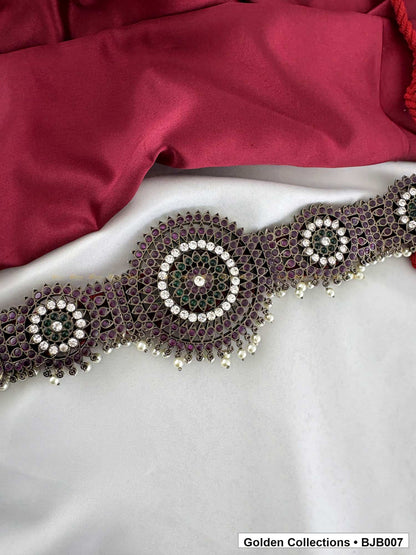 angled product view of Black kemp round medallion vaddanam oddiyanam from Golden Collections
