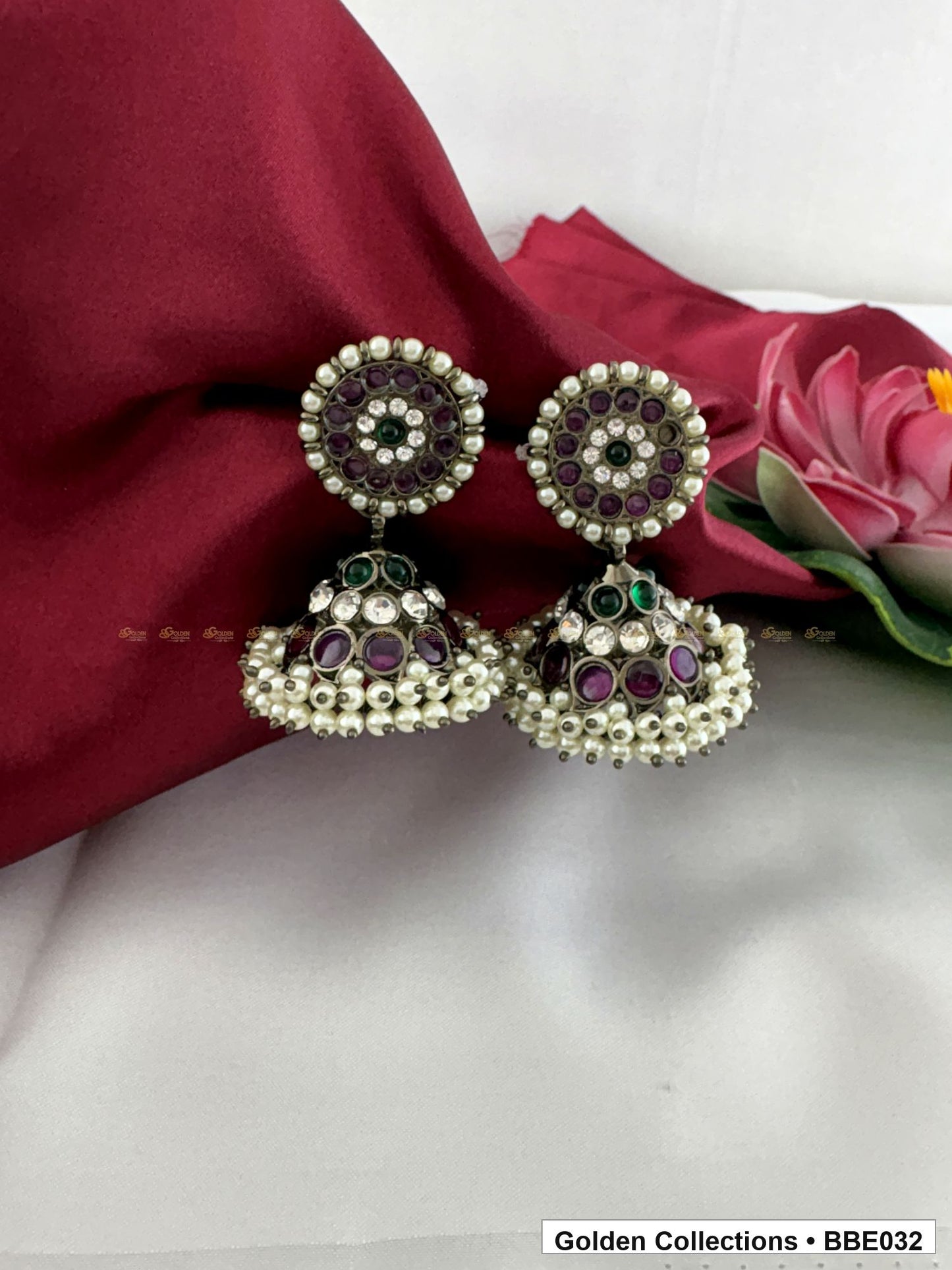 Front view of Black Kemp Three Line Jhumki Earrings for Bharatanatyam from Golden Collections