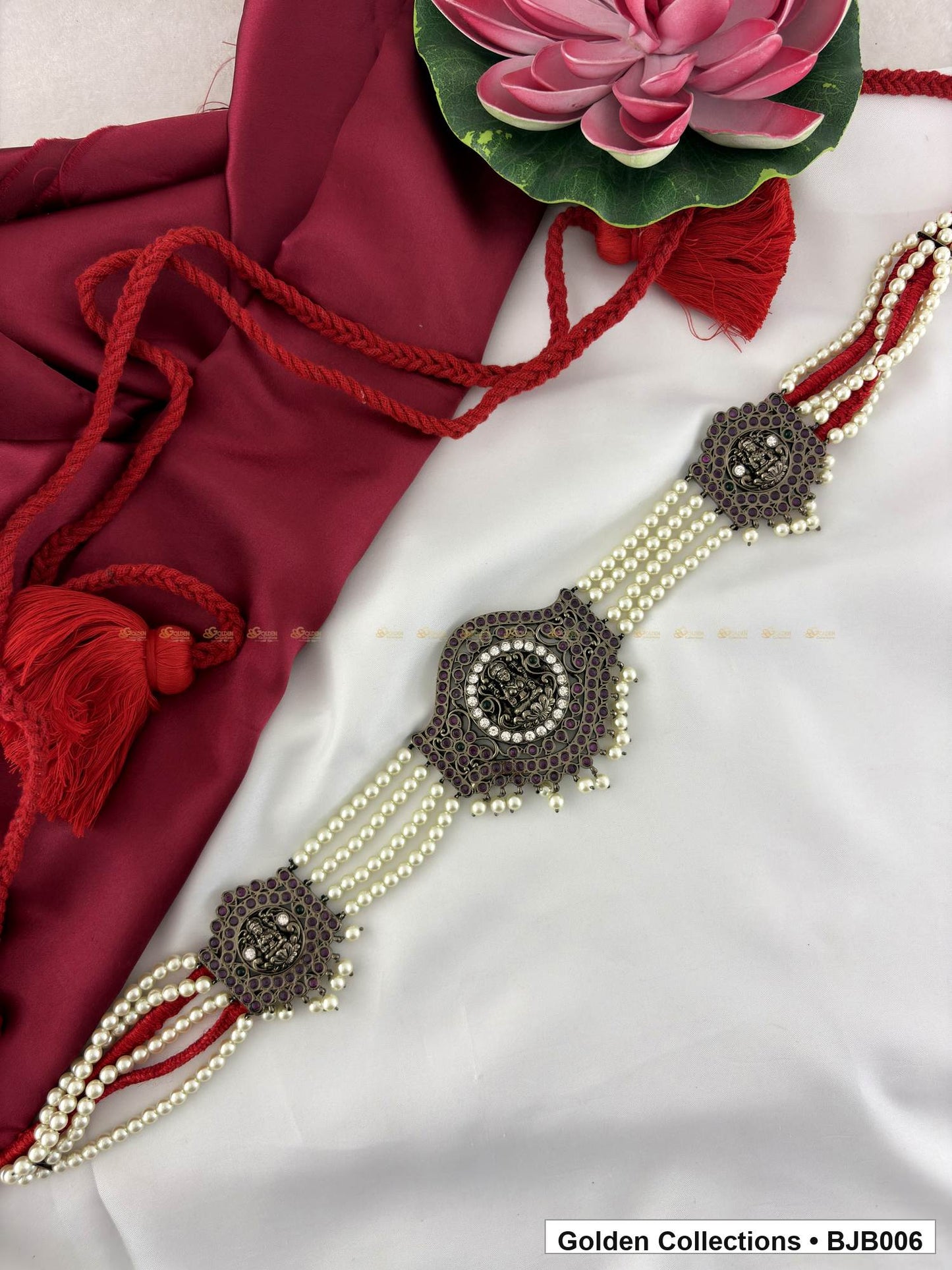 front product view of Black kemp vaddanam oddiyanam with pearl strands from Golden Collections
