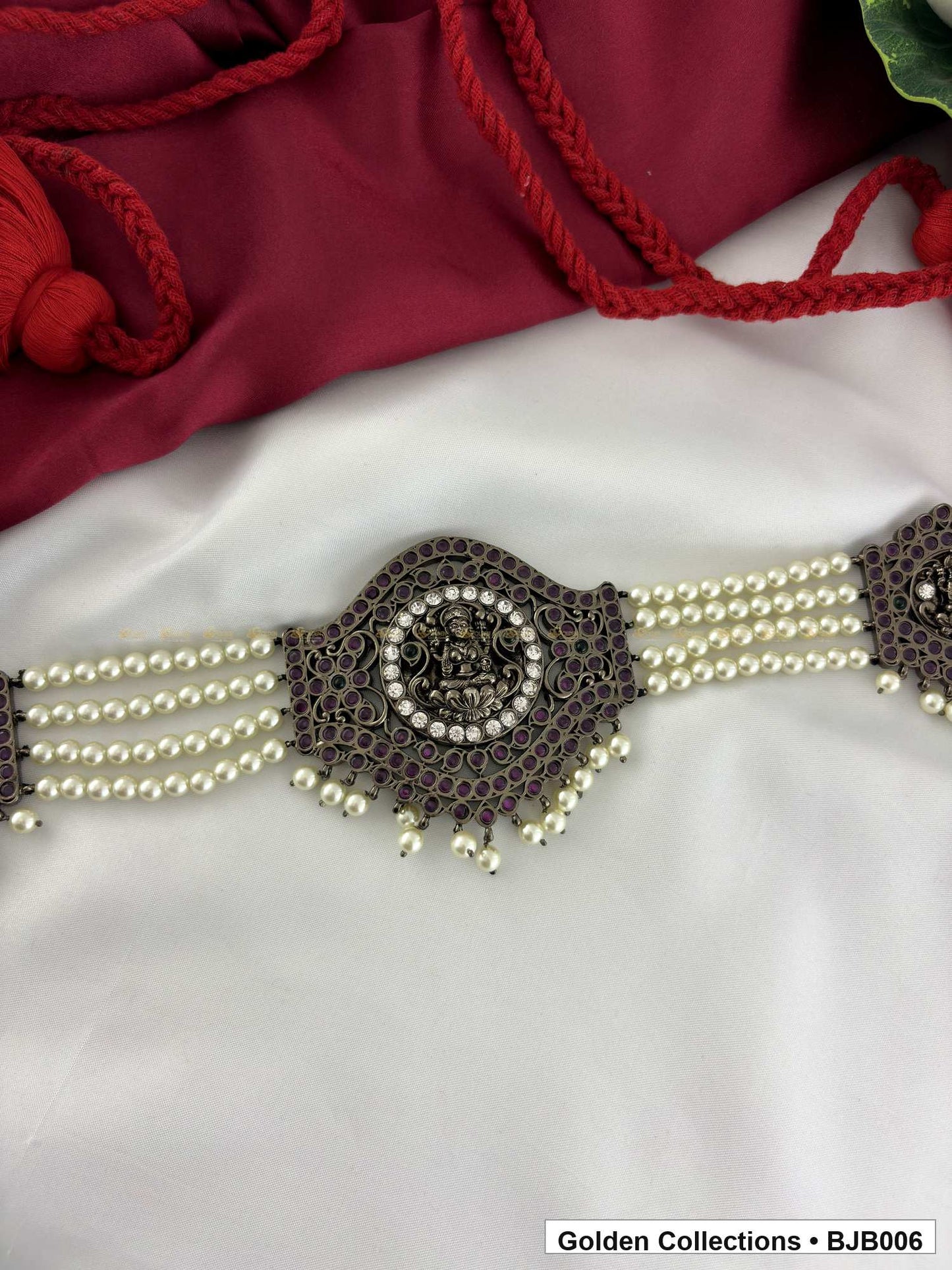 detail product view of Black kemp vaddanam oddiyanam with pearl strands from Golden Collections