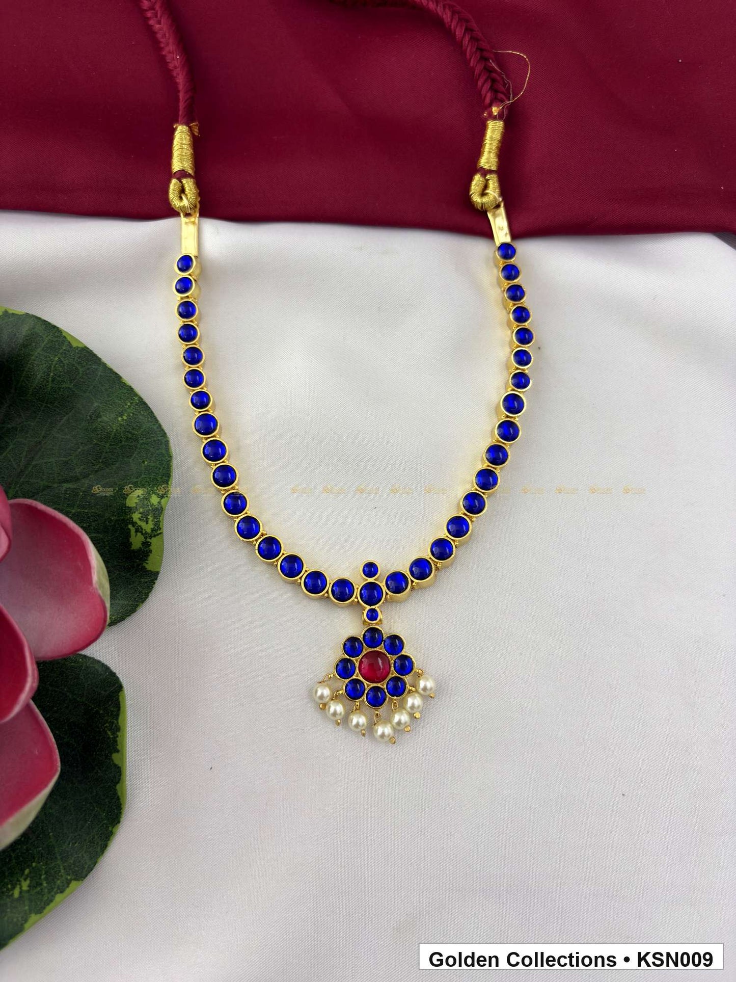 Angled product view of Blue Bead Real Kemp Short Necklace with Pendant from Golden Collections