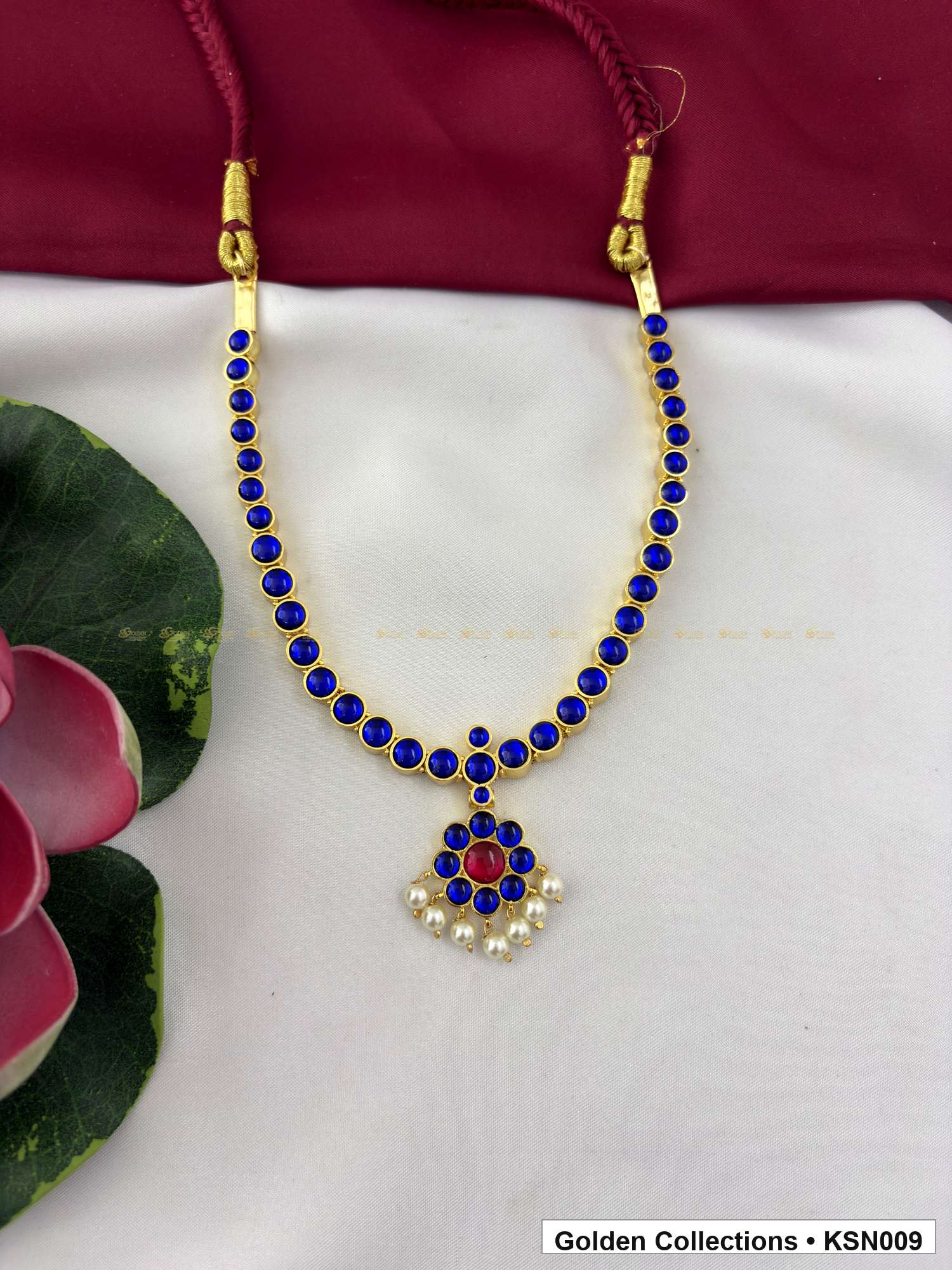 Angled product view of Blue Bead Real Kemp Short Necklace with Pendant from Golden Collections