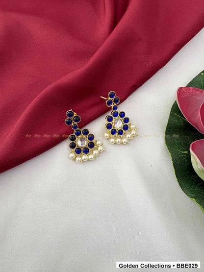 Angled product view of Blue Stone Pearl Real Kemp Jhumki Earrings from Golden Collections