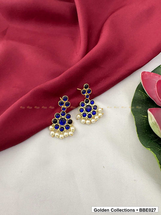 Front view of Blue Stone Real Kemp Jhumki Earrings from Golden Collections