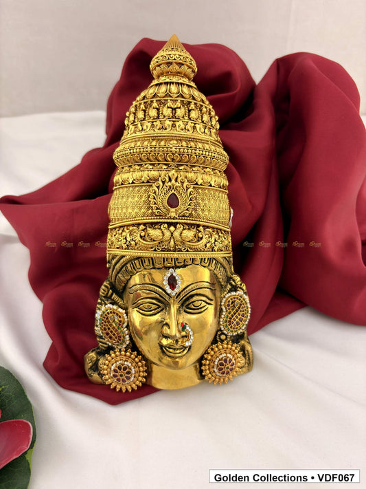Angled view of Decorated Brass Varalakshmi Face for Varamahalakshmi Vratham from Golden Collections