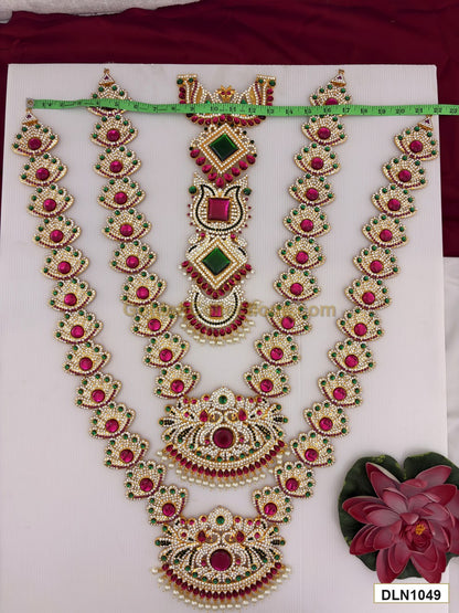 Width measurement photo showing 22 inch deity long haram set with measuring tape for idol alankaram