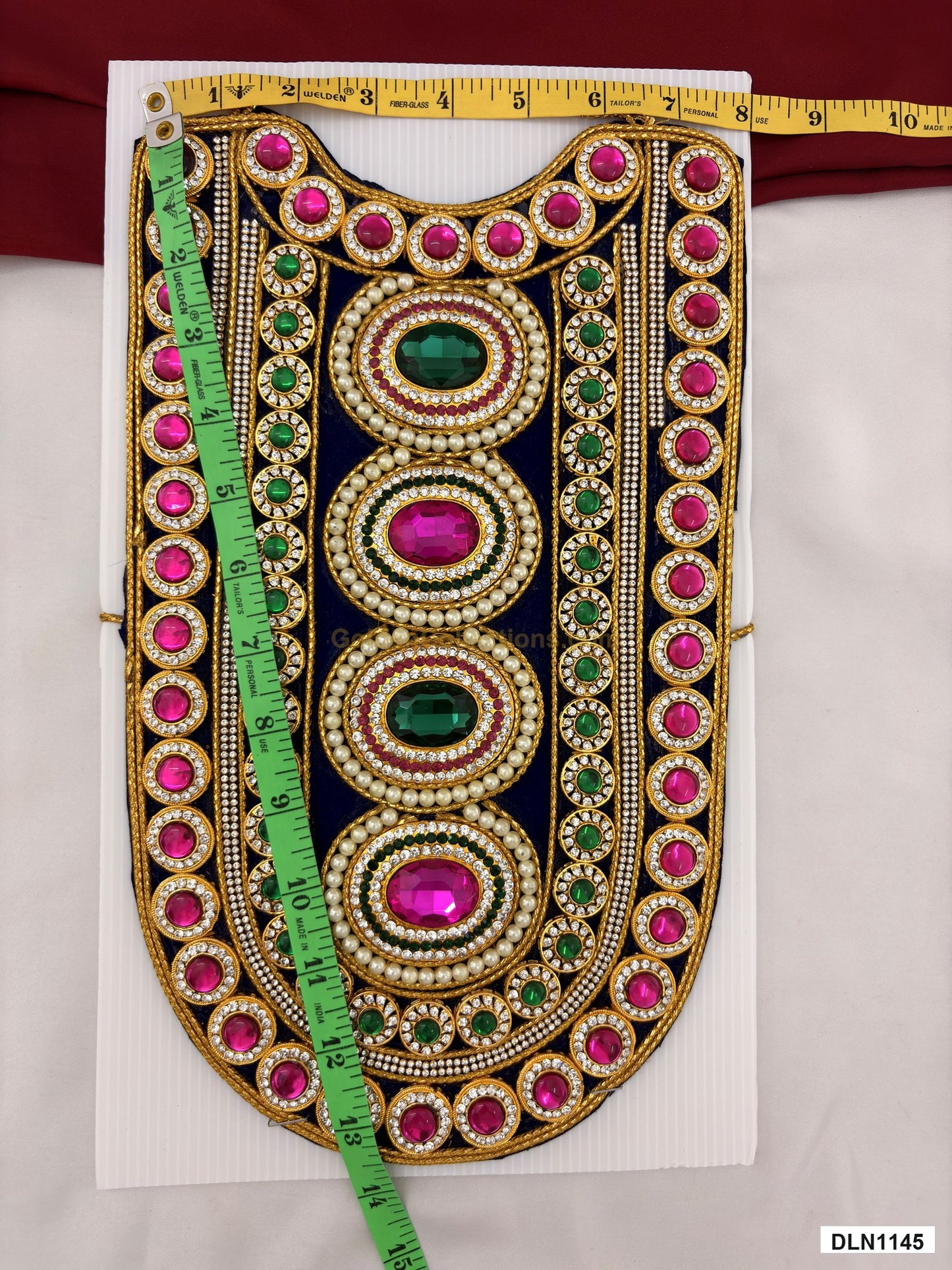 Measurement photo showing 14 x 8 Inches deity chest long haram with measuring tape for idol alankaram