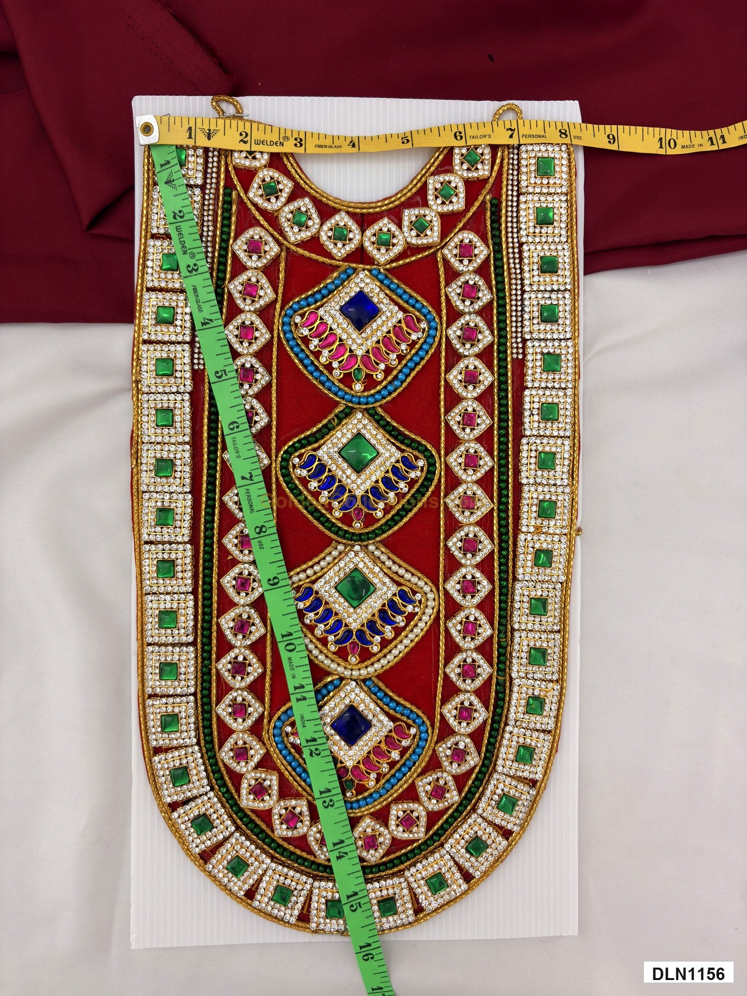 Measurement photo showing 15 x 8 Inches deity chest long haram with measuring tape for idol alankaram