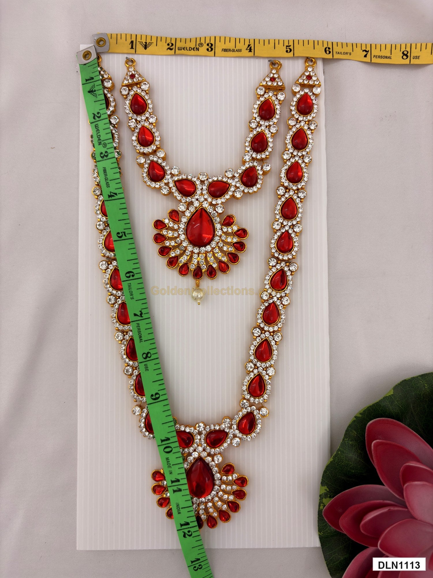 Measurement photo showing 12 x 5 Inches deity chest long haram with measuring tape for idol alankaram