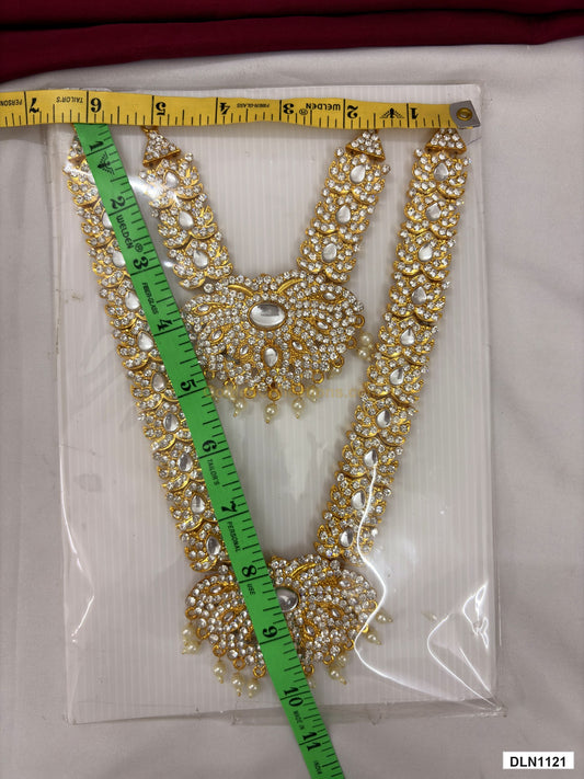 Measurement photo showing 9 x 6 Inches deity chest long haram with measuring tape for idol alankaram
