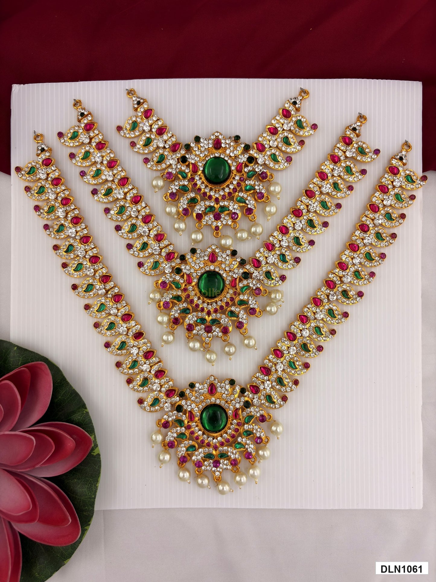 3 step deity long haram DLN1061 full product view with green, pink and gold stone work and gold plating for idol alankaram
