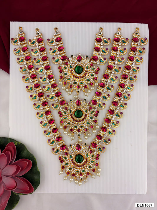 3 step deity long haram DLN1067 full product view with pink, green and gold stone work and gold plating for idol alankaram