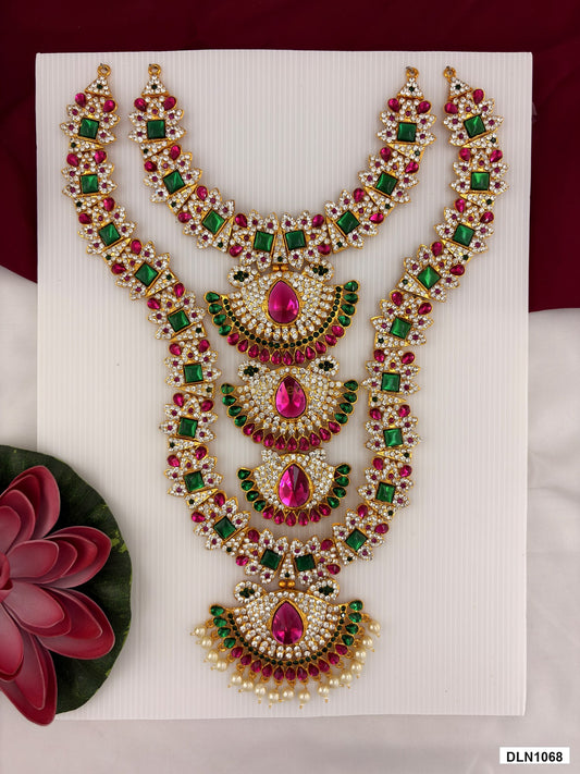 2 step deity long haram DLN1068 full product view with pink, green and gold stone work and gold plating for idol alankaram