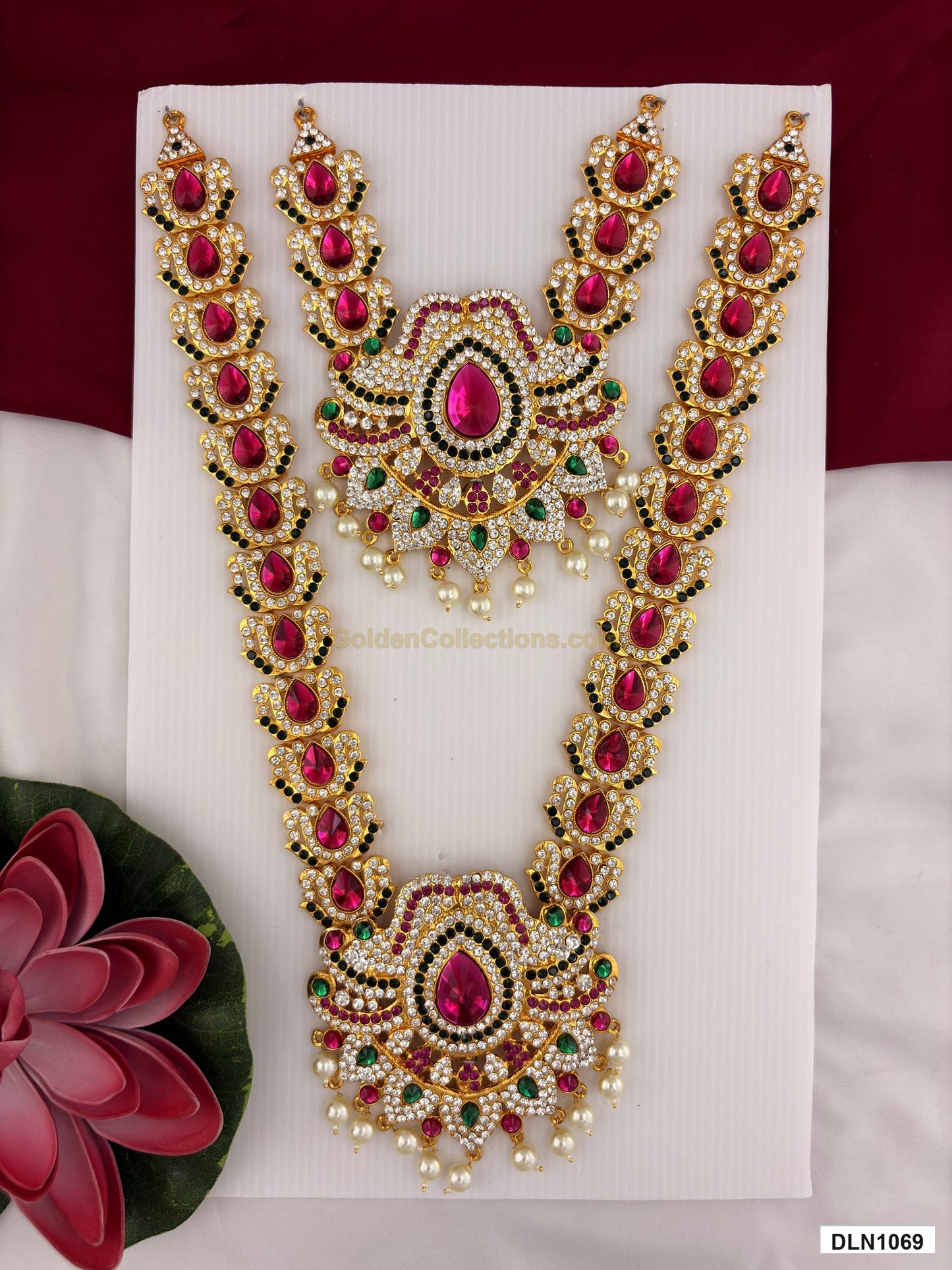 2 step deity long haram DLN1069 full product view with pink, green and gold stone work and gold plating for idol alankaram
