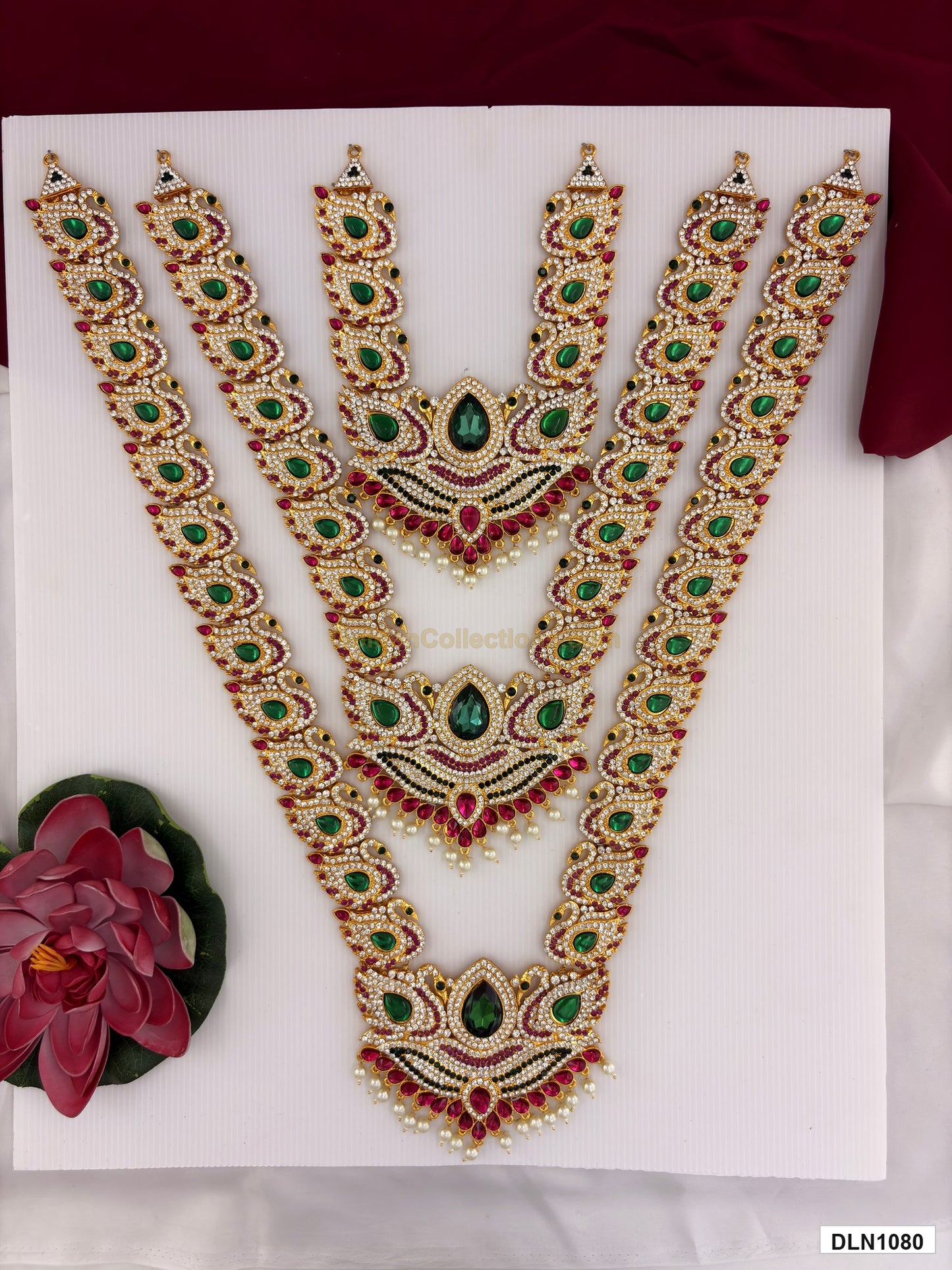 3 step deity long haram DLN1080 full product view with mixed green, pink and gold stone work and gold plating for idol alankaram