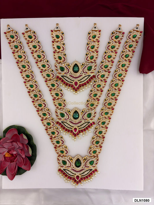 3 step deity long haram DLN1080 full product view with mixed green, pink and gold stone work and gold plating for idol alankaram