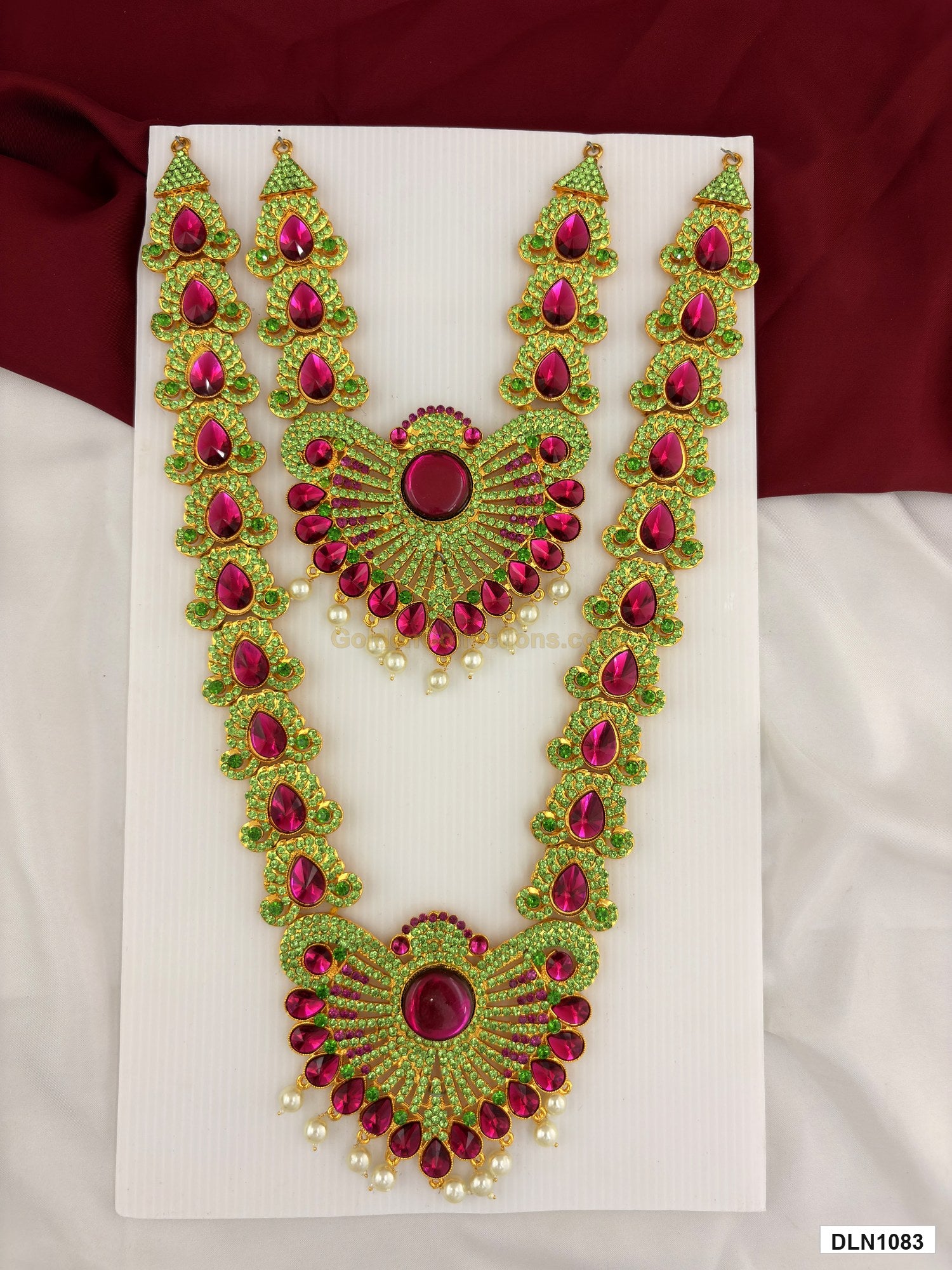 2 step deity long haram DLN1083 full product view with pink, green and gold stone work and gold plating for idol alankaram