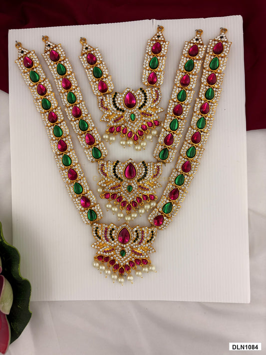 3 step deity long haram DLN1084 full product view with pink, green and gold stone work and gold plating for idol alankaram